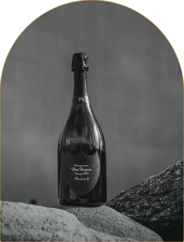 A bottle of Dom Pérignon Plénitude 2 Vintage 2006, photographed on stone